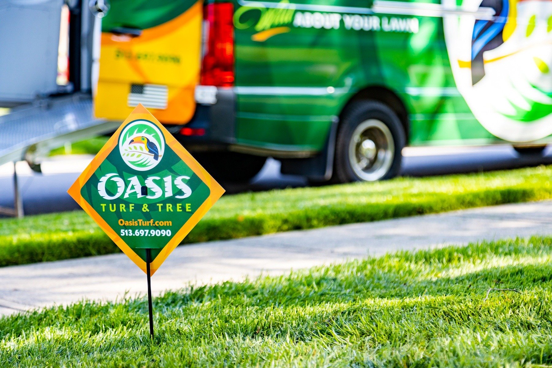 Oasis turf and tree lawn sign