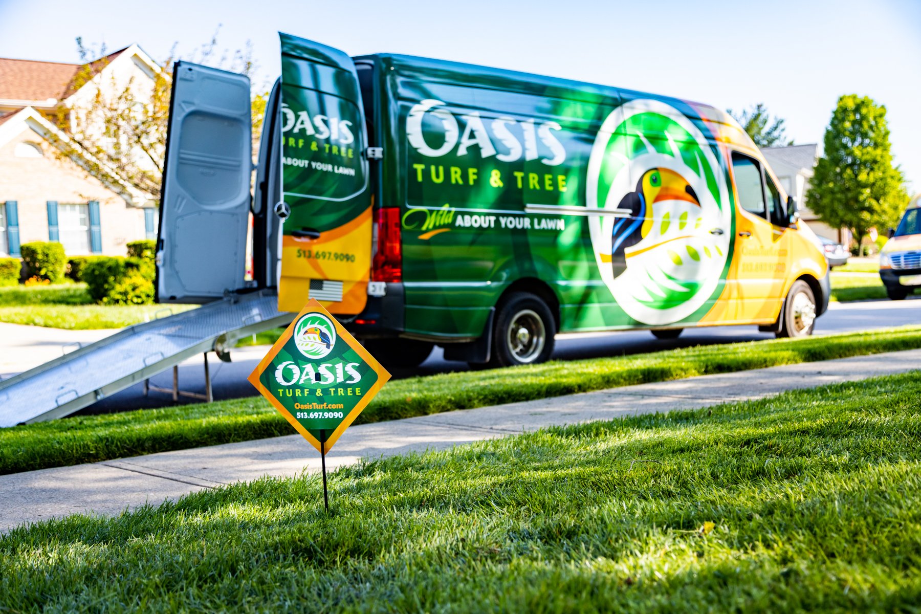 Oasis van and lawn sign