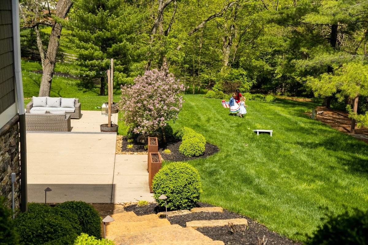 healthy lawn with children playing