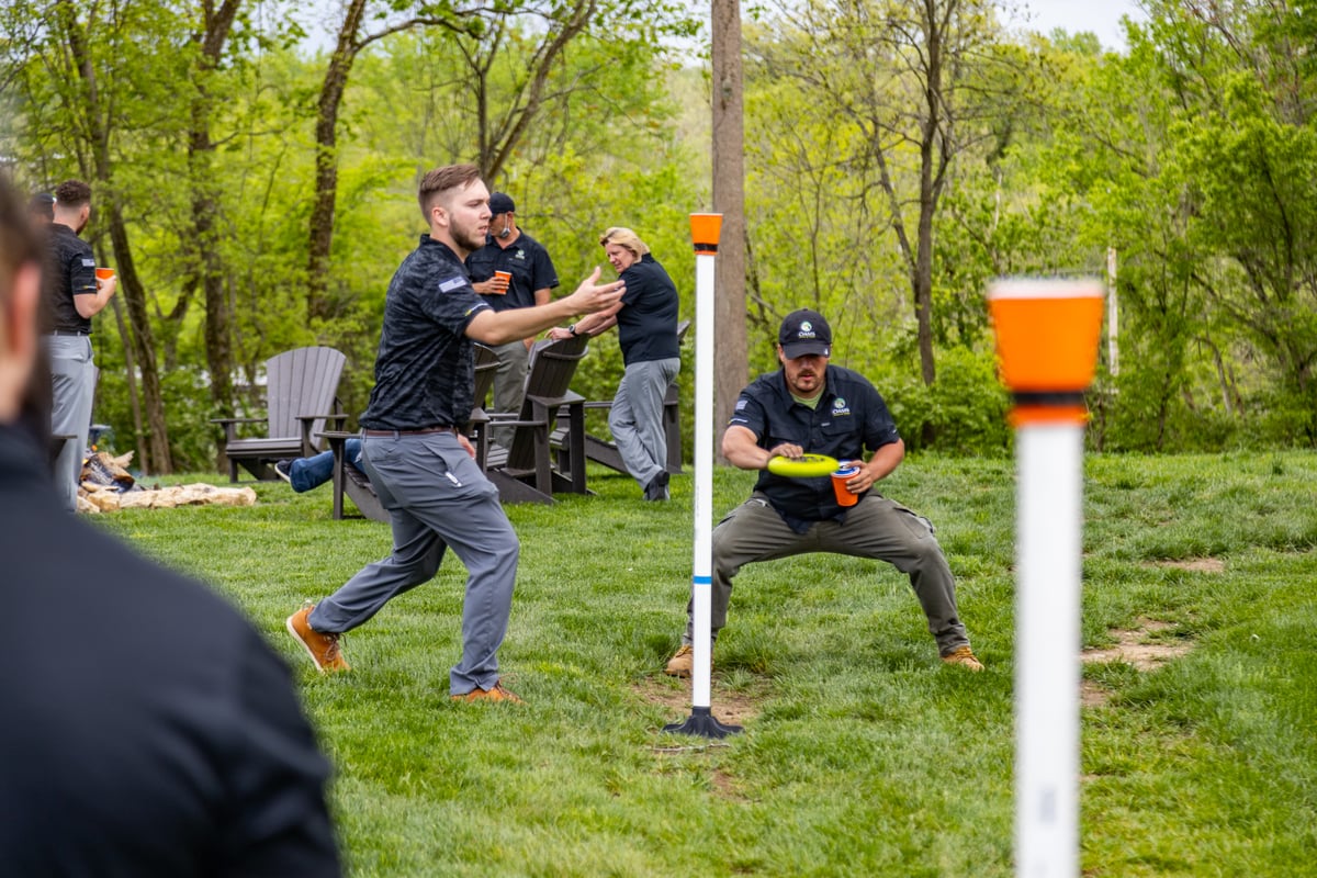 team playing game at picnic