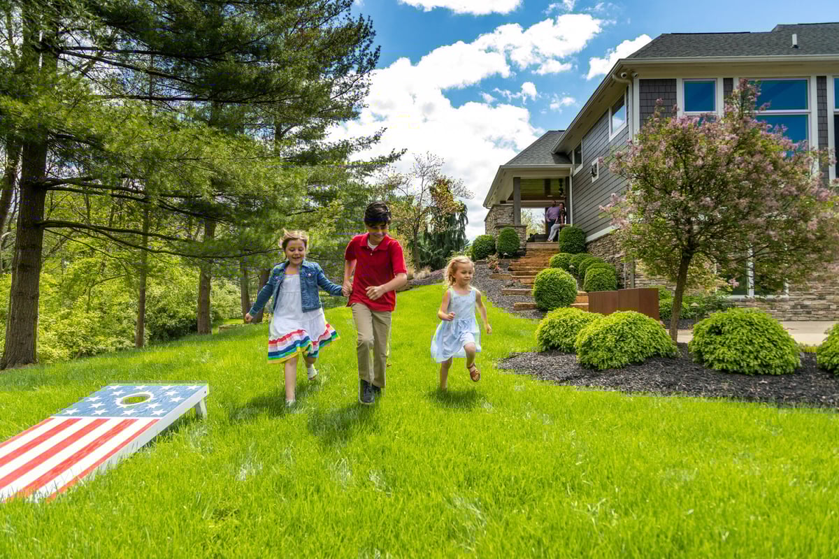 kids running on lawn