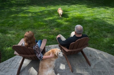 Happy Oasis lawn care customers in yard in Dayton, OH