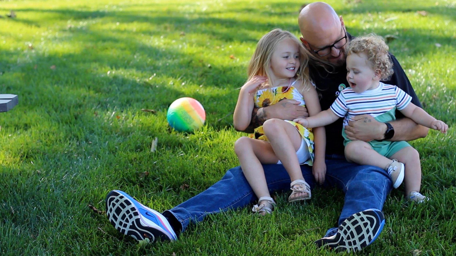 family in nice green grass